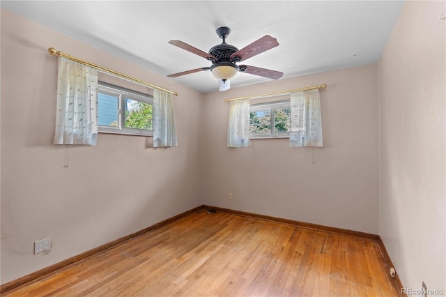 4815 S Pennsylvania St, Englewood, CO 80113 - spare room with healthy amount of natural light, light wood-type flooring, and a ceiling fan