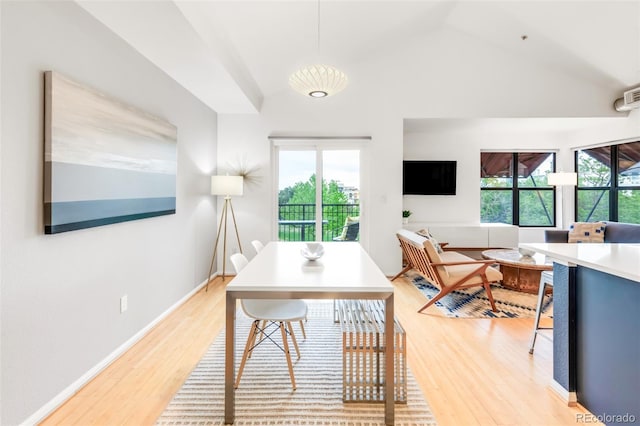 3069 Tejon St Unit B, Denver, CO 80211 - dining room featuring light wood finished floors and lofted ceiling