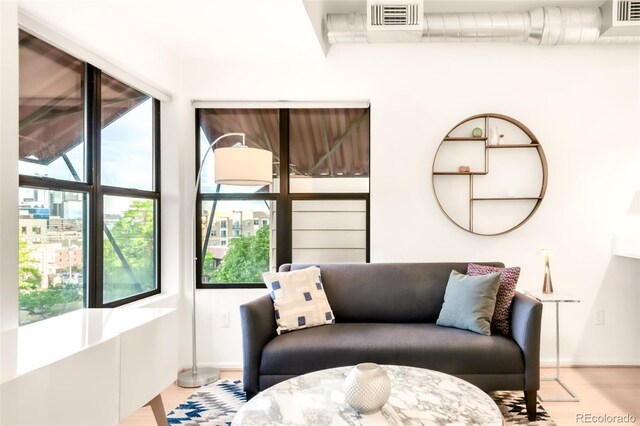 3069 Tejon St Unit B, Denver, CO 80211 - sitting room featuring baseboards and wood finished floors