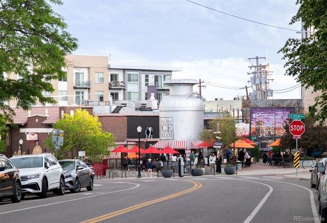 3069 Tejon St Unit B, Denver, CO 80211 - view of asphalt street with traffic signs, street lighting, curbs, and sidewalks