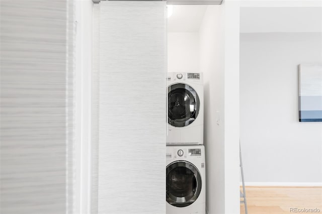 3069 Tejon St Unit B, Denver, CO 80211 - laundry room with stacked washer / drying machine and wood finished floors