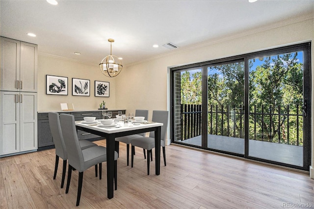 460 S Marion Pkwy Unit 604, Denver, CO 80209 - dining area with a chandelier, crown molding, light wood-style floors, and recessed lighting