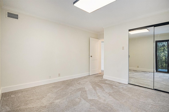 460 S Marion Pkwy Unit 604, Denver, CO 80209 - unfurnished bedroom with carpet flooring, crown molding, and a closet