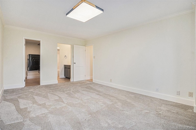 460 S Marion Pkwy Unit 604, Denver, CO 80209 - unfurnished bedroom featuring light colored carpet, ornamental molding, and connected bathroom