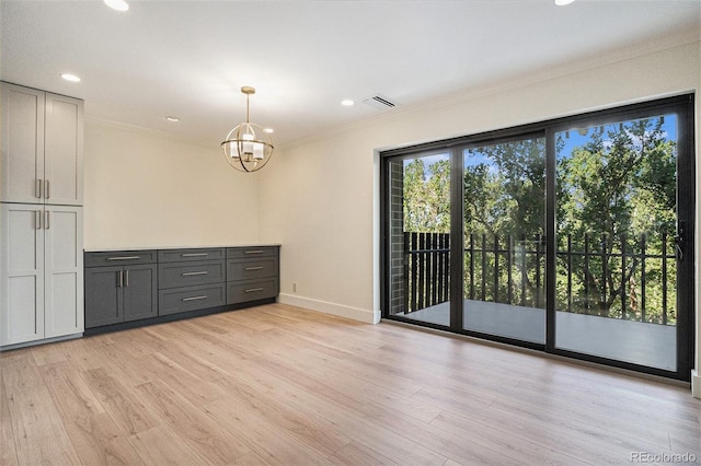 460 S Marion Pkwy Unit 604, Denver, CO 80209 - unfurnished room featuring crown molding, light wood finished floors, a chandelier, and recessed lighting