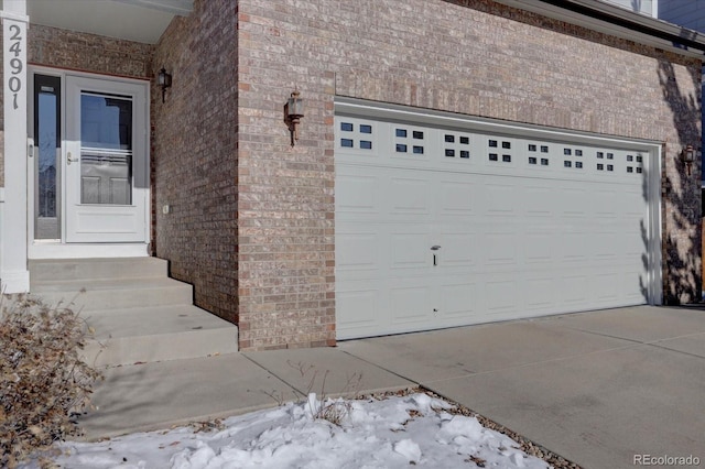 view of snow covered garage