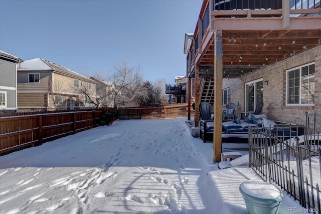 view of yard covered in snow