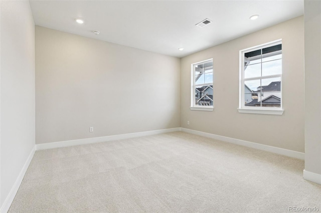 view of carpeted spare room