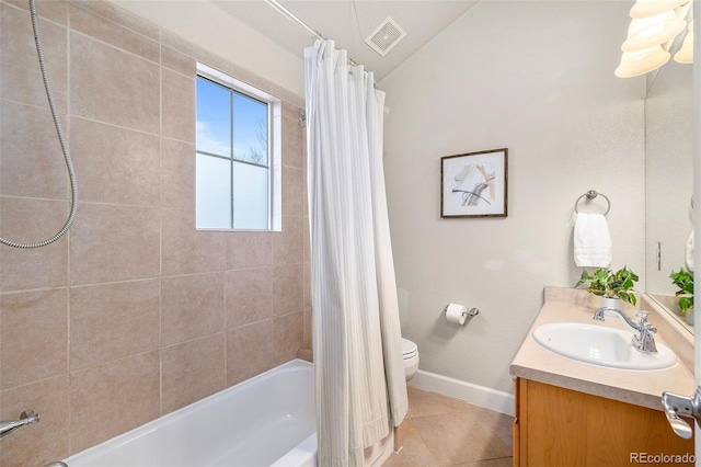 bathroom featuring visible vents, toilet, shower / bath combo with shower curtain, tile patterned floors, and vanity