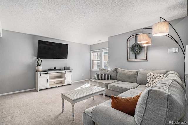 living room with light colored carpet and a textured ceiling