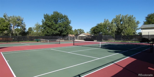 view of tennis court with basketball court