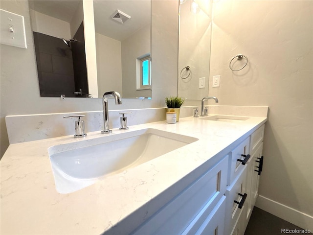 9451 E Evans Pl, Denver, CO 80231 - bathroom with double vanity