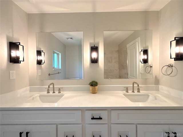 9451 E Evans Pl, Denver, CO 80231 - bathroom featuring double vanity