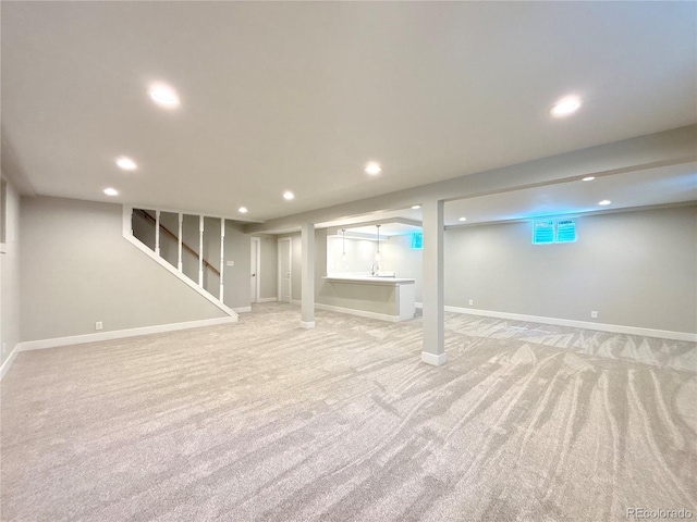 9451 E Evans Pl, Denver, CO 80231 - finished basement featuring light carpet, recessed lighting, and stairs