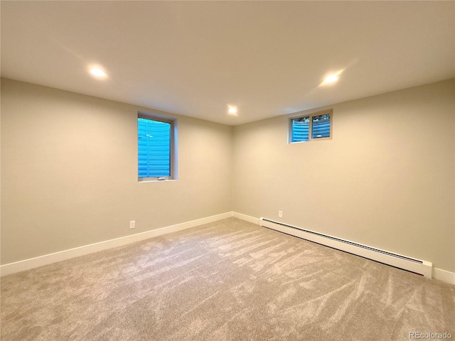 9451 E Evans Pl, Denver, CO 80231 - carpeted empty room featuring a baseboard radiator and recessed lighting