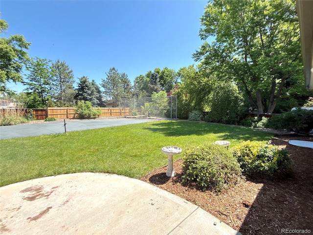 9451 E Evans Pl, Denver, CO 80231 - view of yard featuring a patio area
