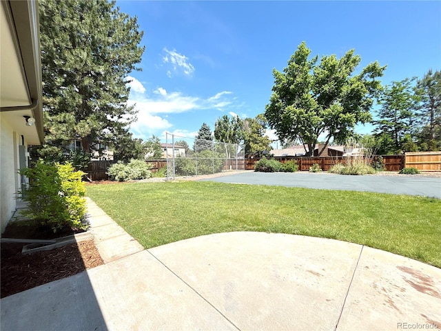 9451 E Evans Pl, Denver, CO 80231 - fenced backyard with a patio