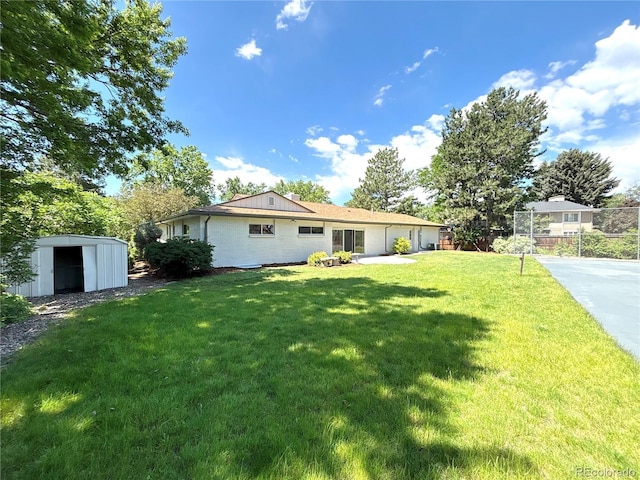 9451 E Evans Pl, Denver, CO 80231 - view of front facade with a shed