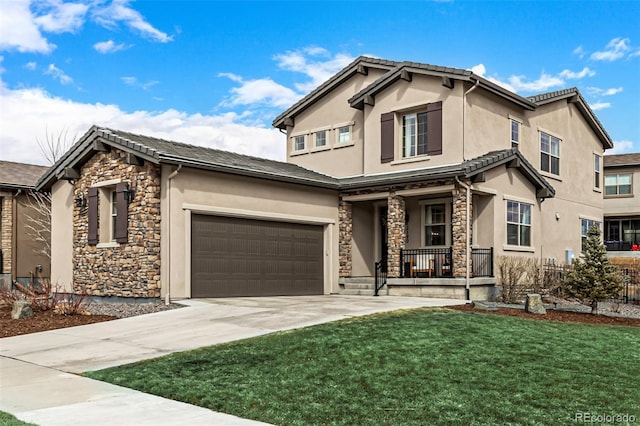 traditional home with a porch, an attached garage, stone siding, concrete driveway, and stucco siding