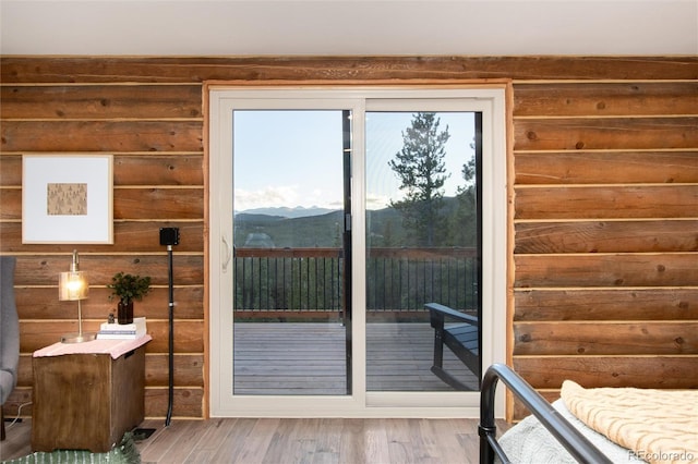 57 Overlook Ct, Idaho Springs, CO 80452 - doorway to outside featuring wood finished floors and a mountain view