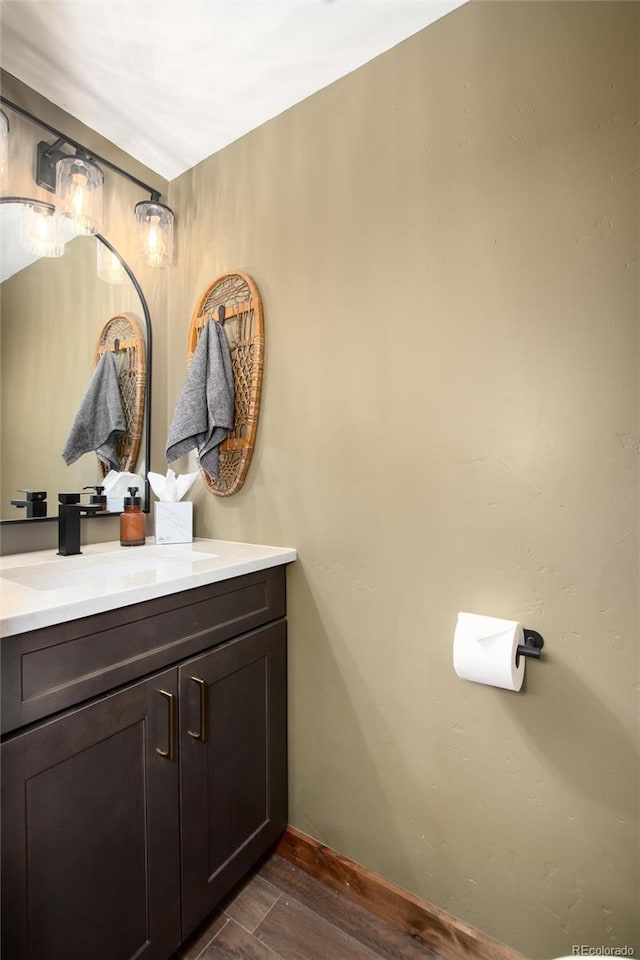 57 Overlook Ct, Idaho Springs, CO 80452 - bathroom with vanity and wood finished floors