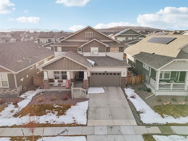 view of front of house with a garage and covered porch