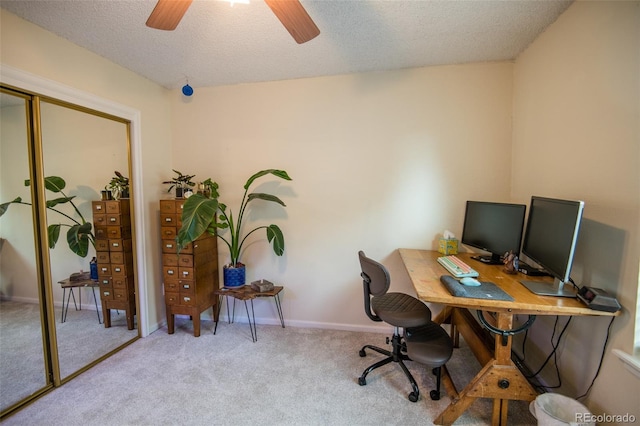 3300 W Florida Ave Unit 37, Denver, CO 80219 - carpeted home office featuring a textured ceiling and a ceiling fan