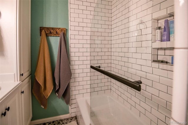 3300 W Florida Ave Unit 37, Denver, CO 80219 - bathroom with vanity and shower / washtub combination