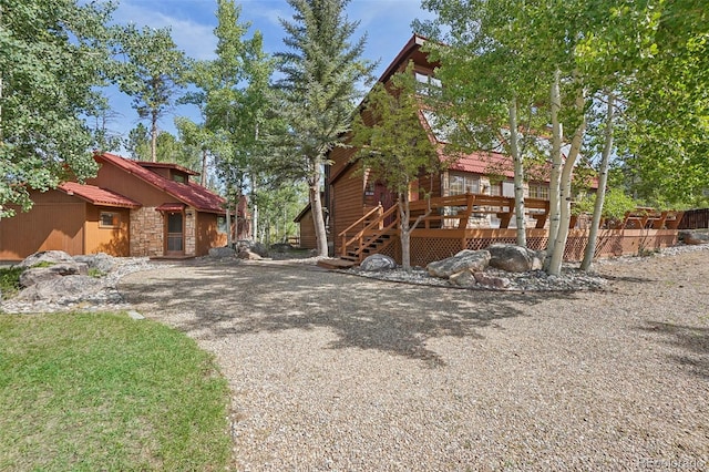 view of front facade with a deck