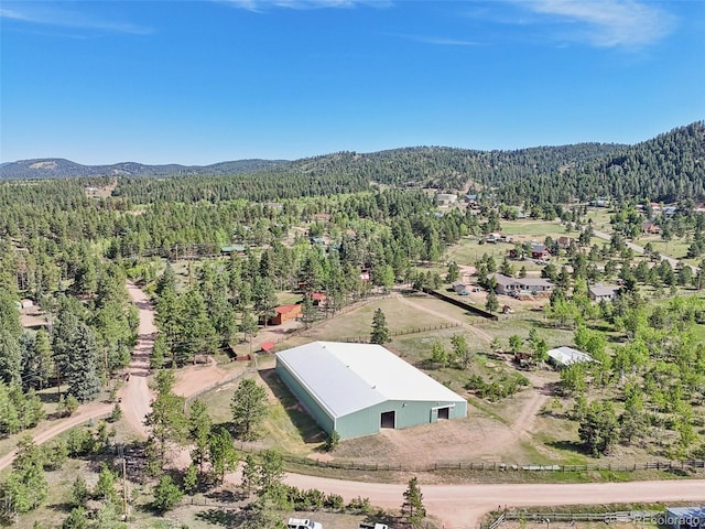 birds eye view of property featuring a mountain view