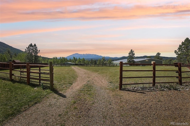 exterior space featuring a rural view and a mountain view