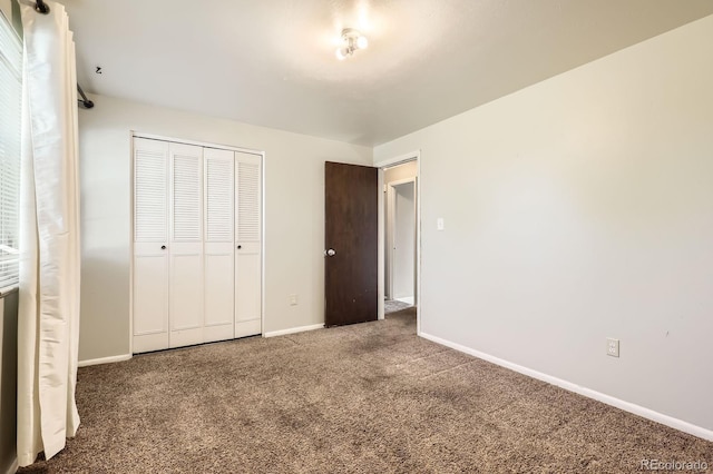 7542 Otis St, Arvada, CO 80003 - unfurnished bedroom with carpet and a closet