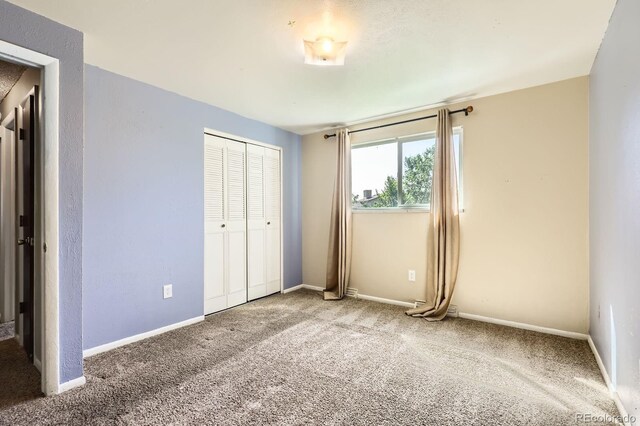7542 Otis St, Arvada, CO 80003 - unfurnished bedroom with carpet flooring and a closet