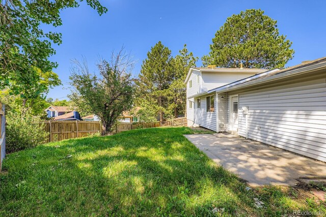 7542 Otis St, Arvada, CO 80003 - view of yard with a patio area