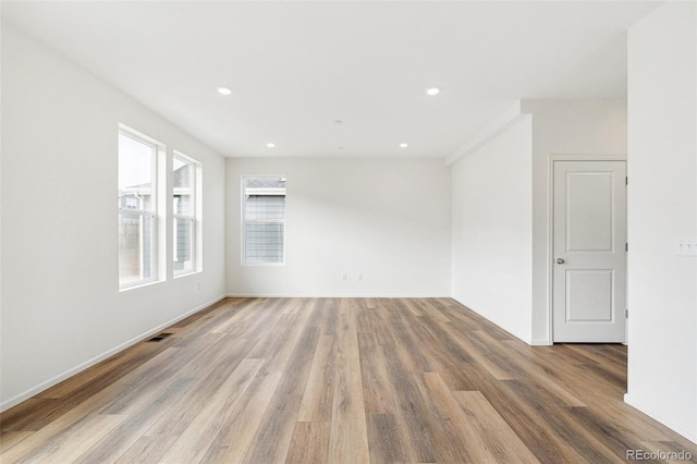 13402 E 110th Way, Commerce City, CO 80022 - unfurnished room with wood finished floors and recessed lighting