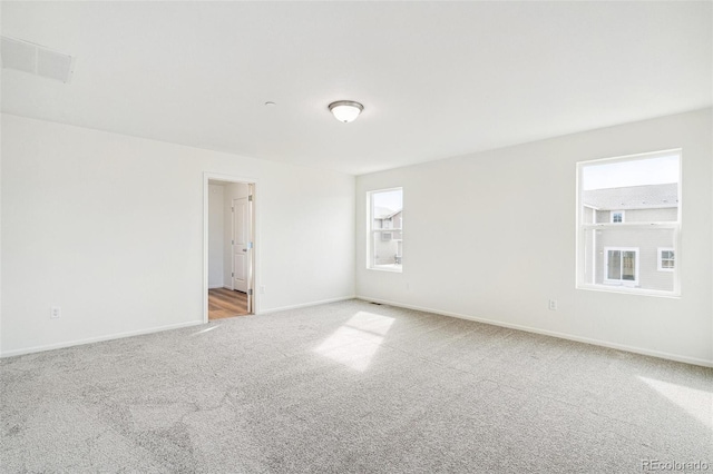 13402 E 110th Way, Commerce City, CO 80022 - spare room featuring light colored carpet and baseboards
