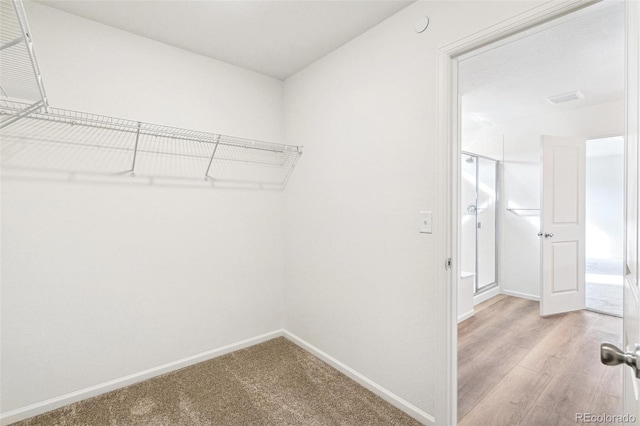 13402 E 110th Way, Commerce City, CO 80022 - spacious closet featuring light wood-style flooring