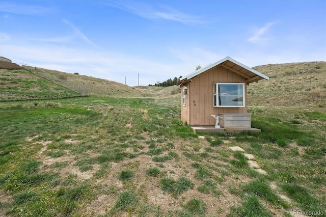 12101 Riverdale Rd, Brighton, CO 80602 - view of yard featuring an outbuilding