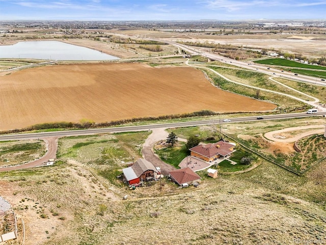 12101 Riverdale Rd, Brighton, CO 80602 - aerial view of property's location featuring a large body of water and rural landscape
