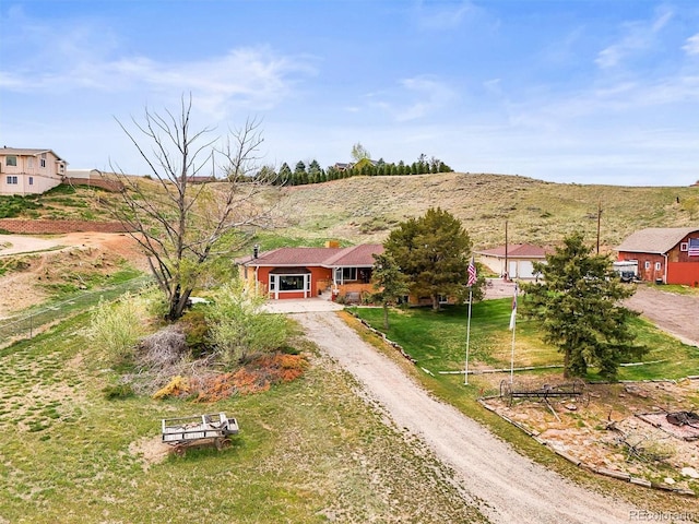 12101 Riverdale Rd, Brighton, CO 80602 - view of front of home featuring dirt driveway