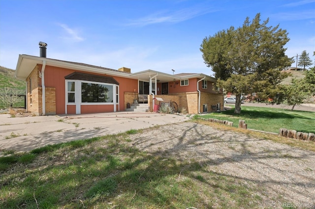 12101 Riverdale Rd, Brighton, CO 80602 - view of front of home with brick siding