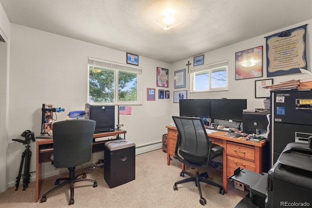 12101 Riverdale Rd, Brighton, CO 80602 - carpeted office with a baseboard heating unit