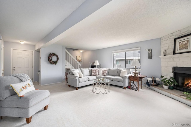 60 S Moline St, Aurora, CO 80012 - living area with stairway, carpet, and a fireplace
