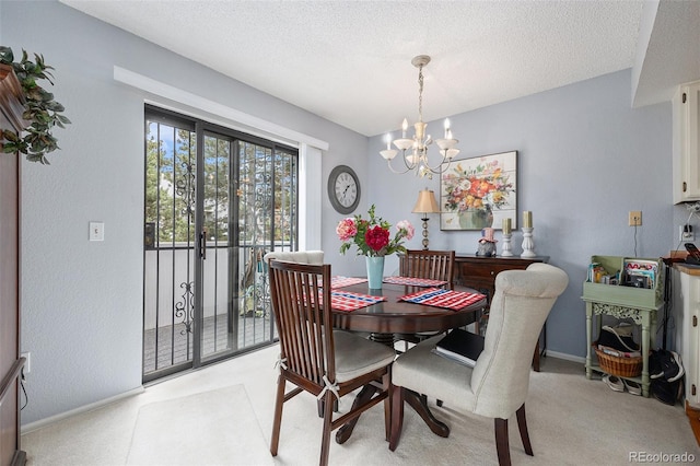 60 S Moline St, Aurora, CO 80012 - dining space featuring a chandelier and a textured ceiling