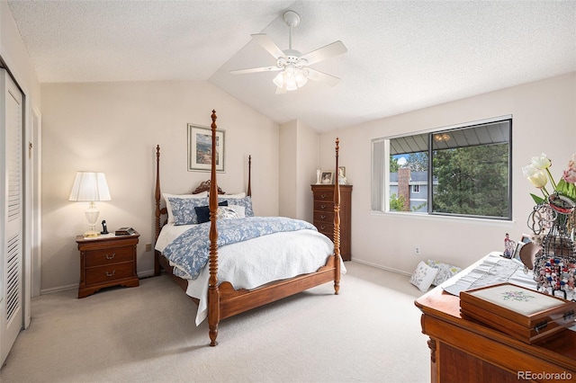 60 S Moline St, Aurora, CO 80012 - bedroom featuring carpet floors, lofted ceiling, ceiling fan, and a textured ceiling