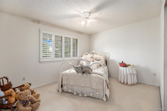 60 S Moline St, Aurora, CO 80012 - bedroom with carpet flooring, a textured ceiling, and a ceiling fan