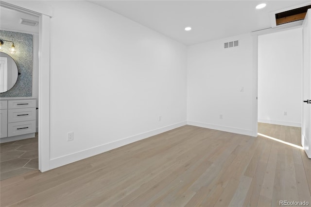 unfurnished bedroom with light hardwood / wood-style floors