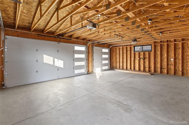 garage featuring a garage door opener