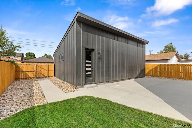 view of outdoor structure featuring a yard