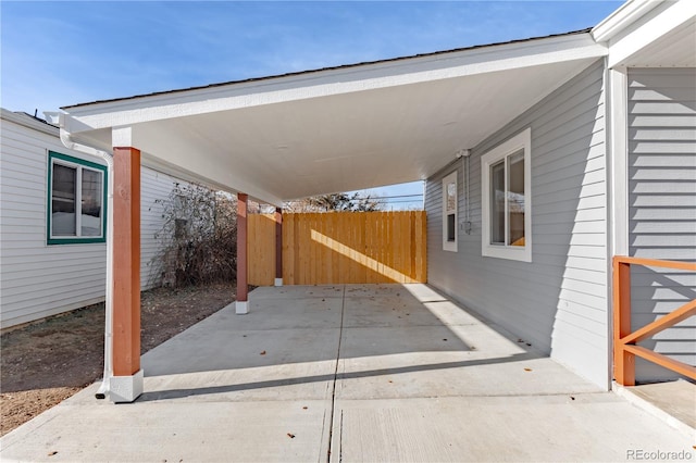 view of patio / terrace featuring a carport